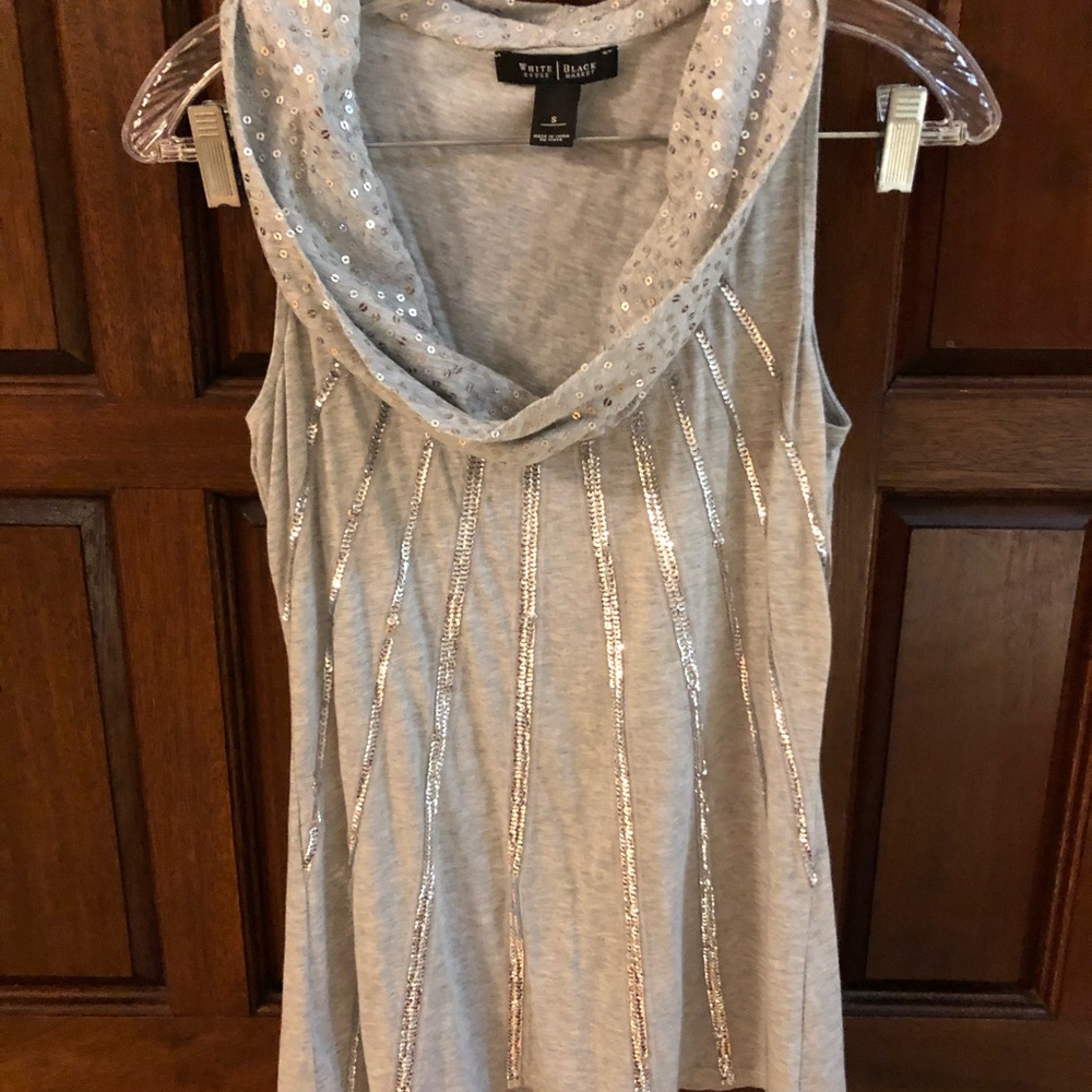 Grey sleeveless top, cowl neck color. Sparkles